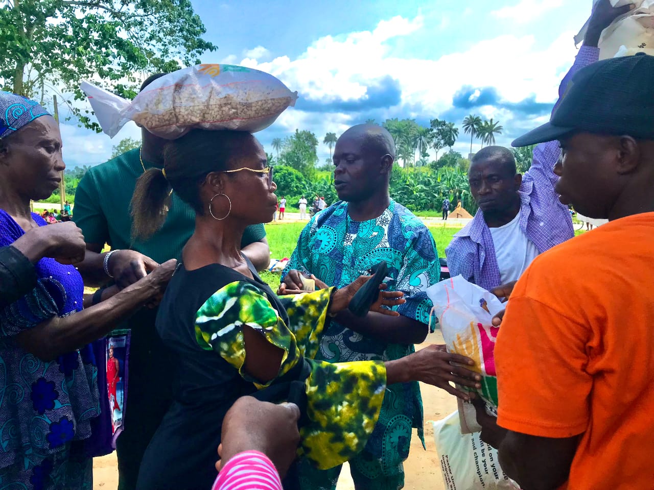 EXCITEMENT IN URUEOFFONG/ORUKO AS BENEFICIARIES RECEIVE FOOD PALLIATIVES FROM GOV. ENO