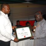 JOHN CLETON ETIM HONOURED BY RAFFIA CITY ELDERS